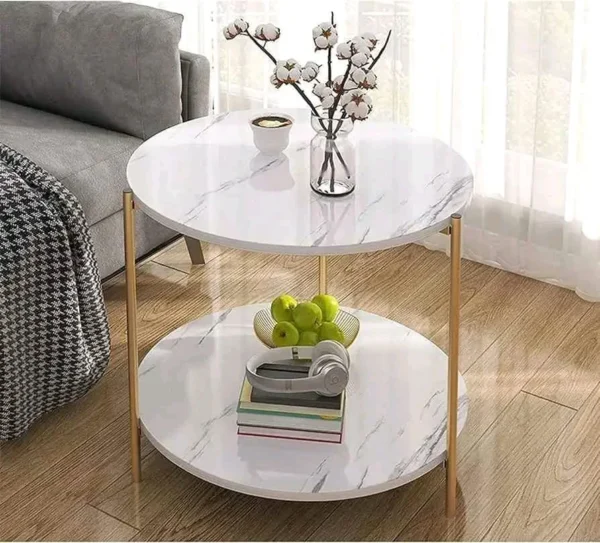 Table basse avec plateau en pierre et structure en métal